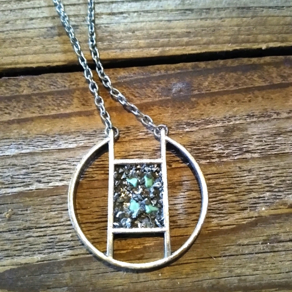 Turquoise and pyrite chip silvertone long neck